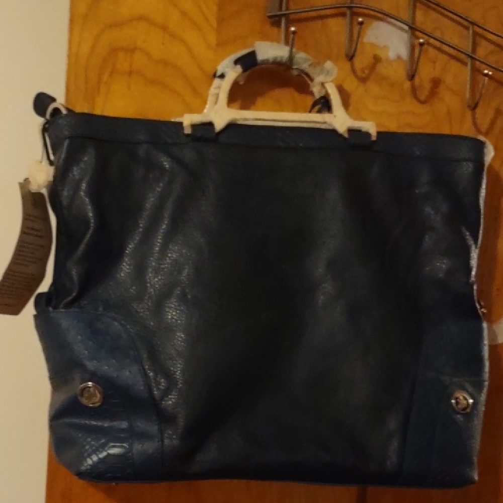 Joy Manganos designer drop bag